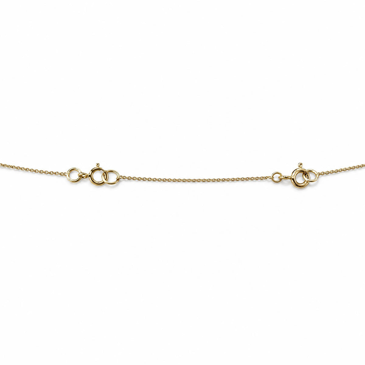 Gold necklace extender on a white background