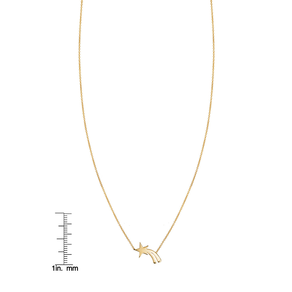 Gold shooting star pendant necklace by Phoenix Roze shown with ruler for scale