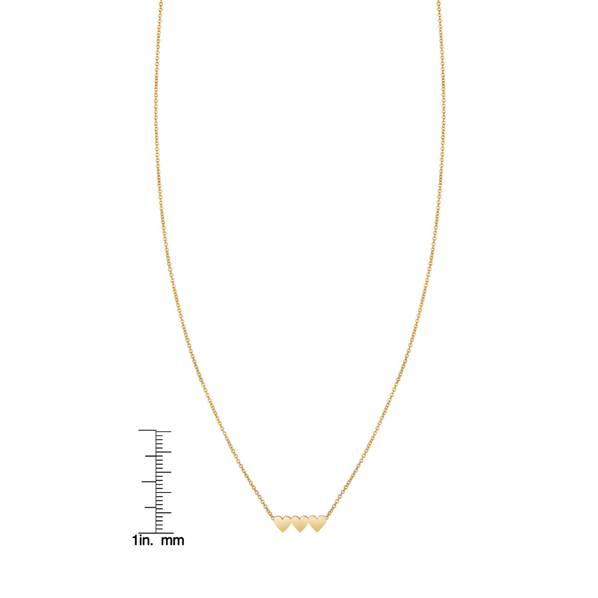 Gold triple heart necklace, delicate linked hearts, shown with ruler for size reference