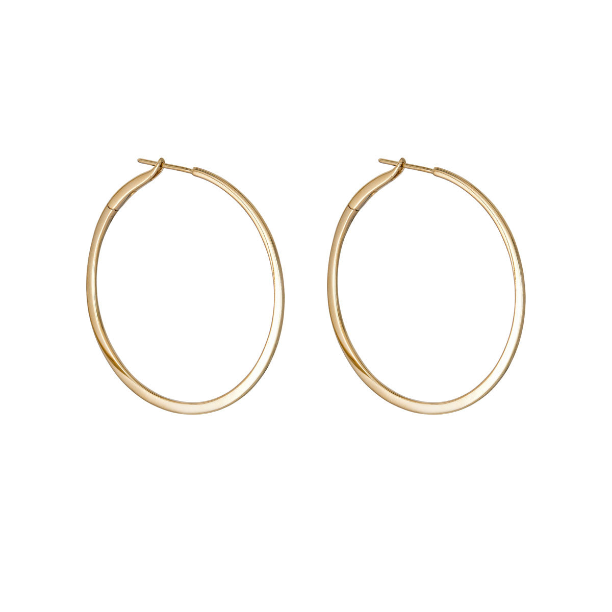 Side view of 1.5-inch skinny solid 14K gold hoop earrings—classic, lightweight everyday hoops by Phoenix Roze