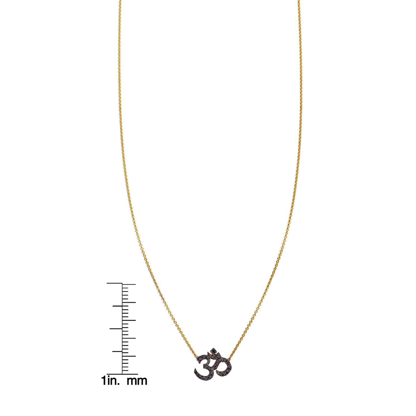 Black diamond gold Ohm necklace shown next to ruler for size, elegant spiritual pendant on a delicate chain