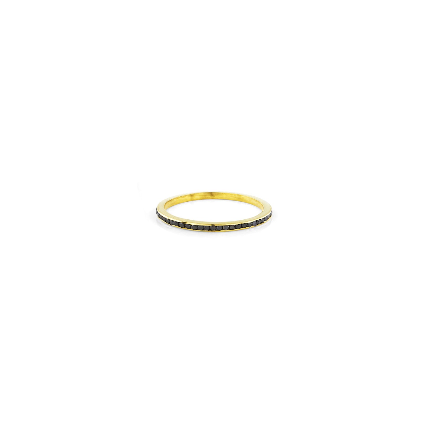 Prongless channel set black diamond eternity band in 14K yellow gold, sleek minimalist ring handcrafted in NYC