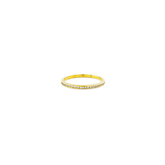 Channel set white diamond eternity band in 14K yellow gold — classic brilliance with a modern, minimal flush-set profile