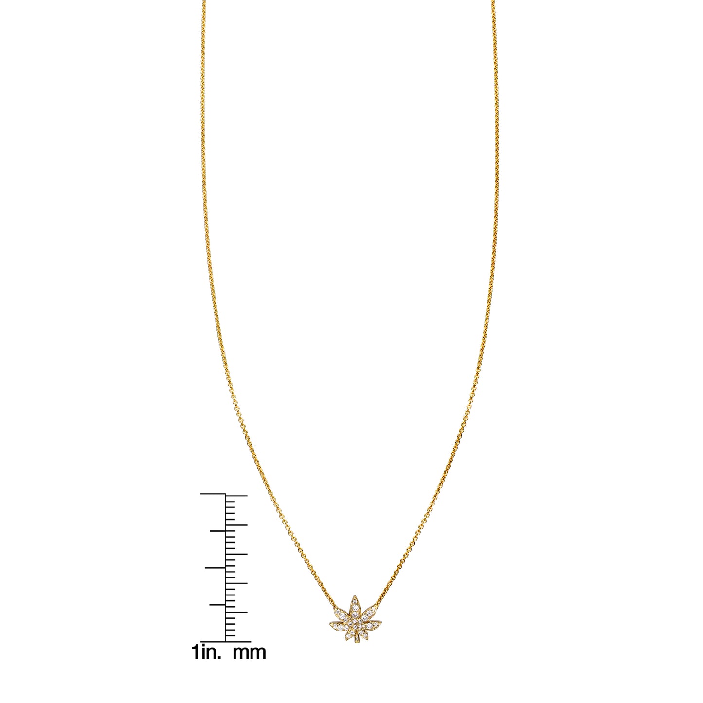 Diamond gold pot leaf pendant necklace by Phoenix Roze shown with a ruler for size reference