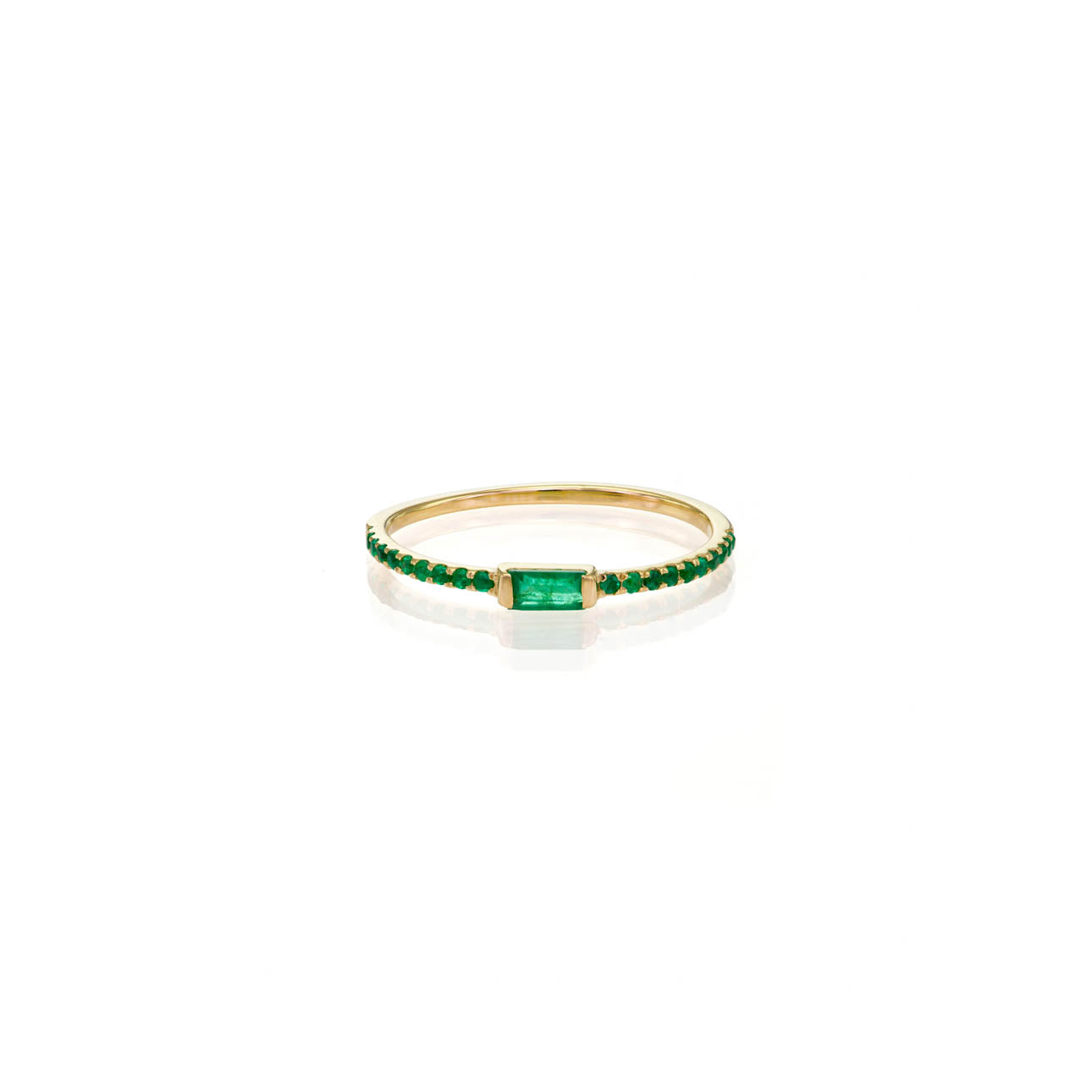 Emerald baguette ring with 4mm emerald and pavé emeralds on a gold band, available in rose, white, or yellow gold