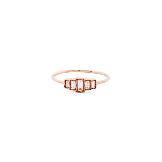 Rose gold Art Deco baguette diamond ring in 14k, five rectangular diamonds on a delicate band, 1920s Gatsby style.