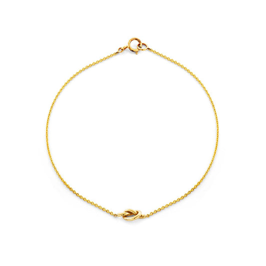 Solid 14k gold Love Knot bracelet symbolizing eternal love, 7mm width, 6.75-inch length, handcrafted in NYC