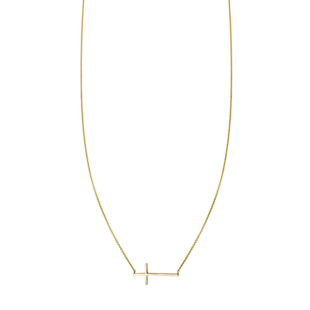 14k gold sideways cross necklace symbolizing balance, polished finish on delicate chain, handcrafted in NYC