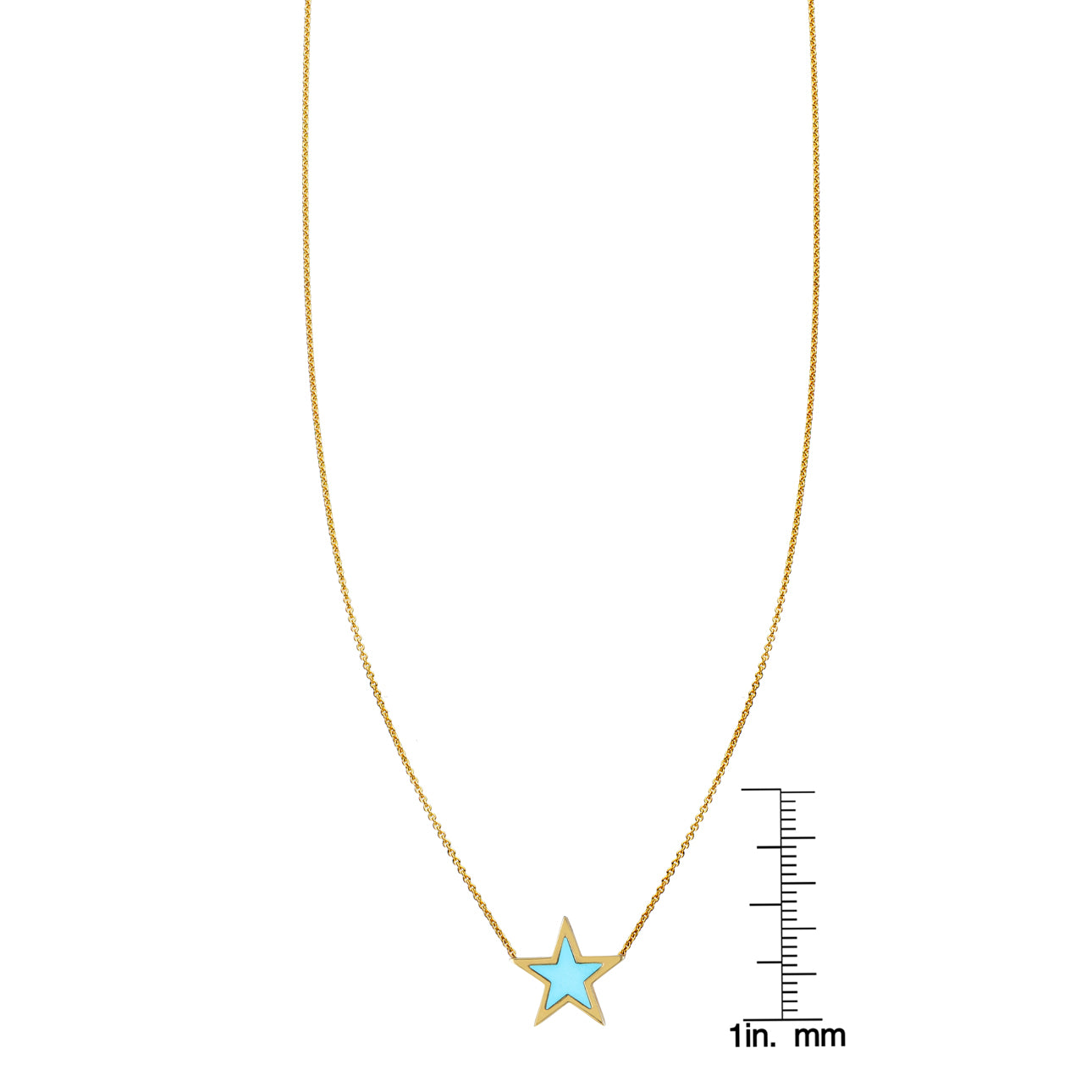 Turquoise inlaid star pendant necklace on delicate gold chain, close-up jewelry photo by Phoenix Roze