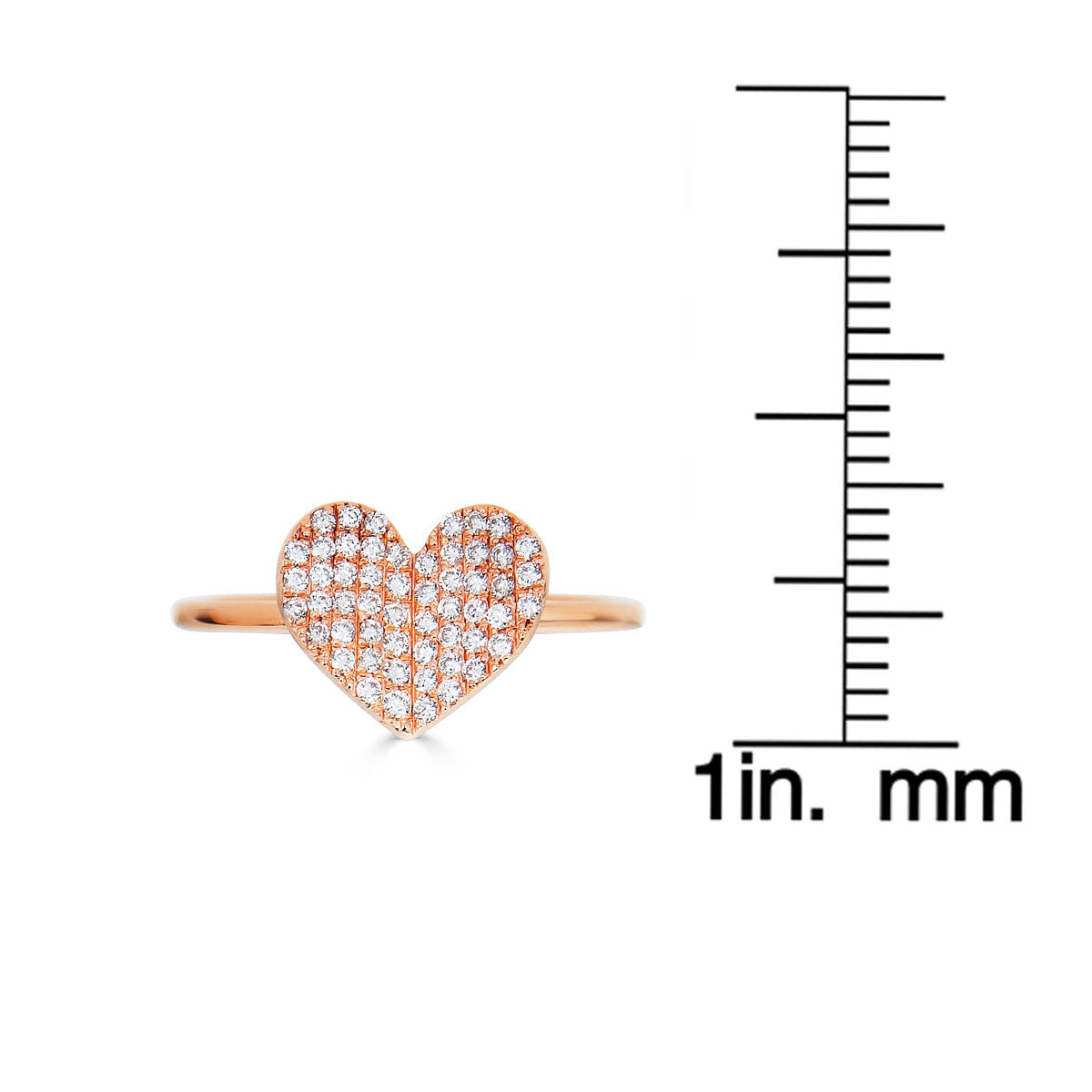 Phoenix Roze large white diamond folded heart ring next to ruler for size reference