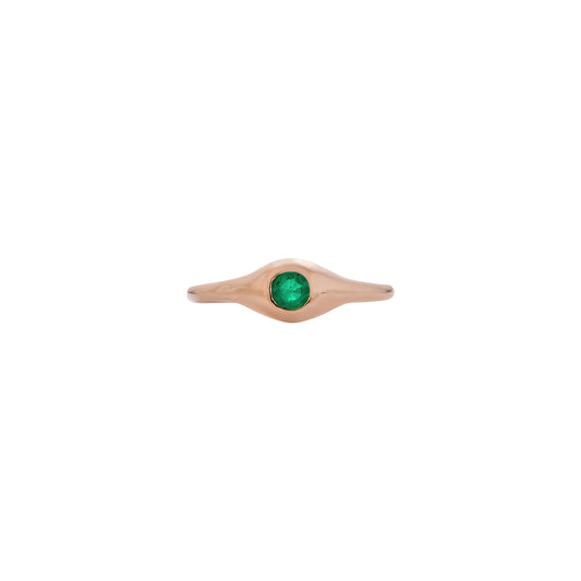 Small round emerald signet ring in 14k gold, a modern heirloom symbolizing strength and love.