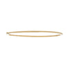 Solid 14k gold hinged bangle bracelet with sleek, gleaming finish, slender and stackable for effortless sophistication.
