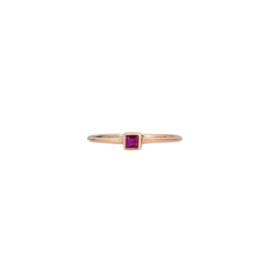 Square-cut ruby ring, bezel-set in solid gold; minimalist design available in yellow, white, or rose gold.
