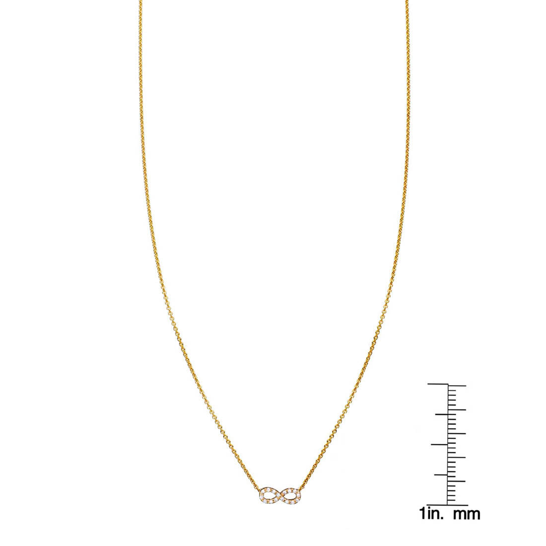 White diamond tiny infinity necklace beside a ruler for scale, delicate diamond infinity pendant on fine chain
