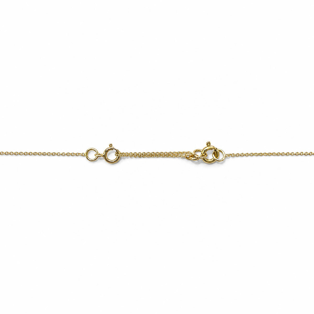14k gold necklace extender folded in half to show 1-inch length option on white background