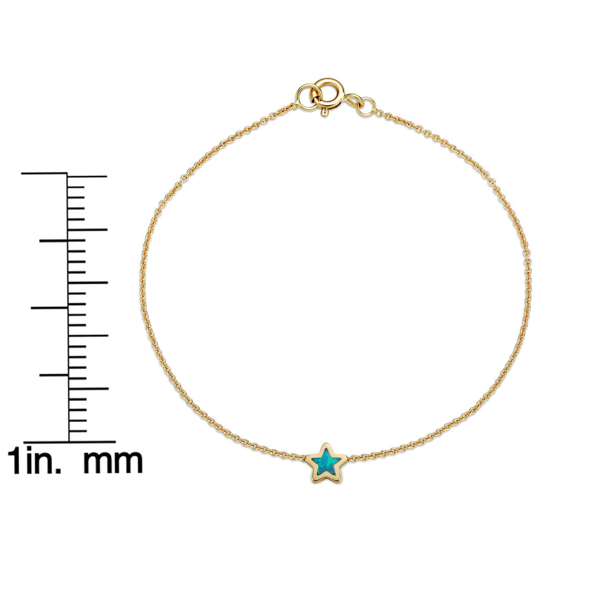 14k gold opal star bracelet shown next to inch and millimeter ruler for size reference