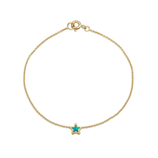 Handmade 14k yellow gold opal star bracelet with blue-green inlay on white background