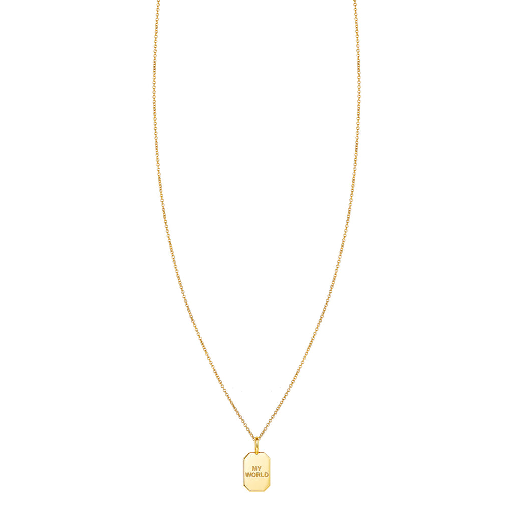 Gold tag necklace engraved with the phrase My World on a fine chain