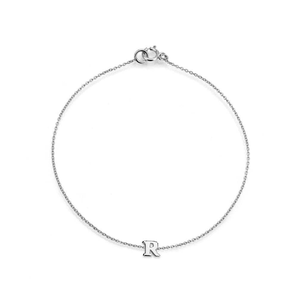 Sterling silver chain bracelet with a single initial 'R' charm.