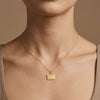 Protect the Dolls 14k gold pendant necklace worn on model at collarbone length