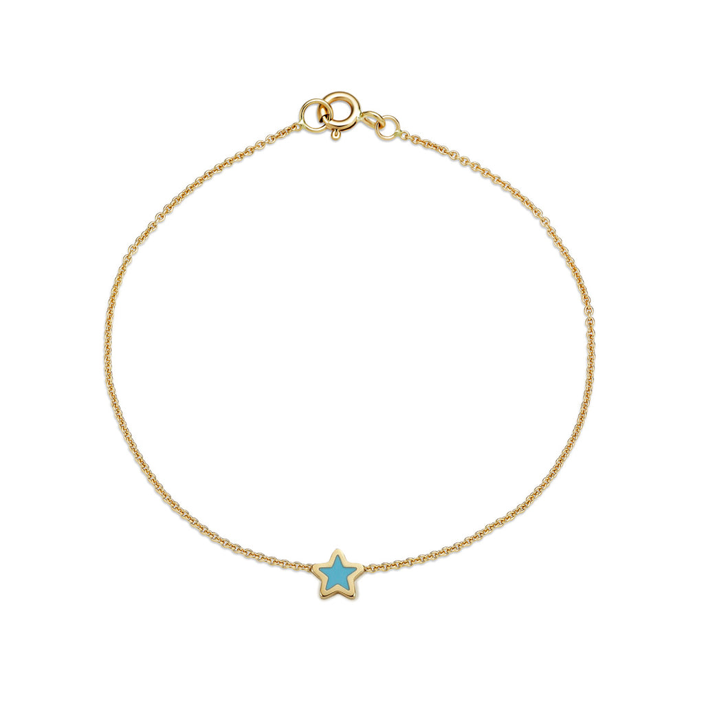 Handmade 14k yellow gold turquoise star bracelet with blue inlay on white background
