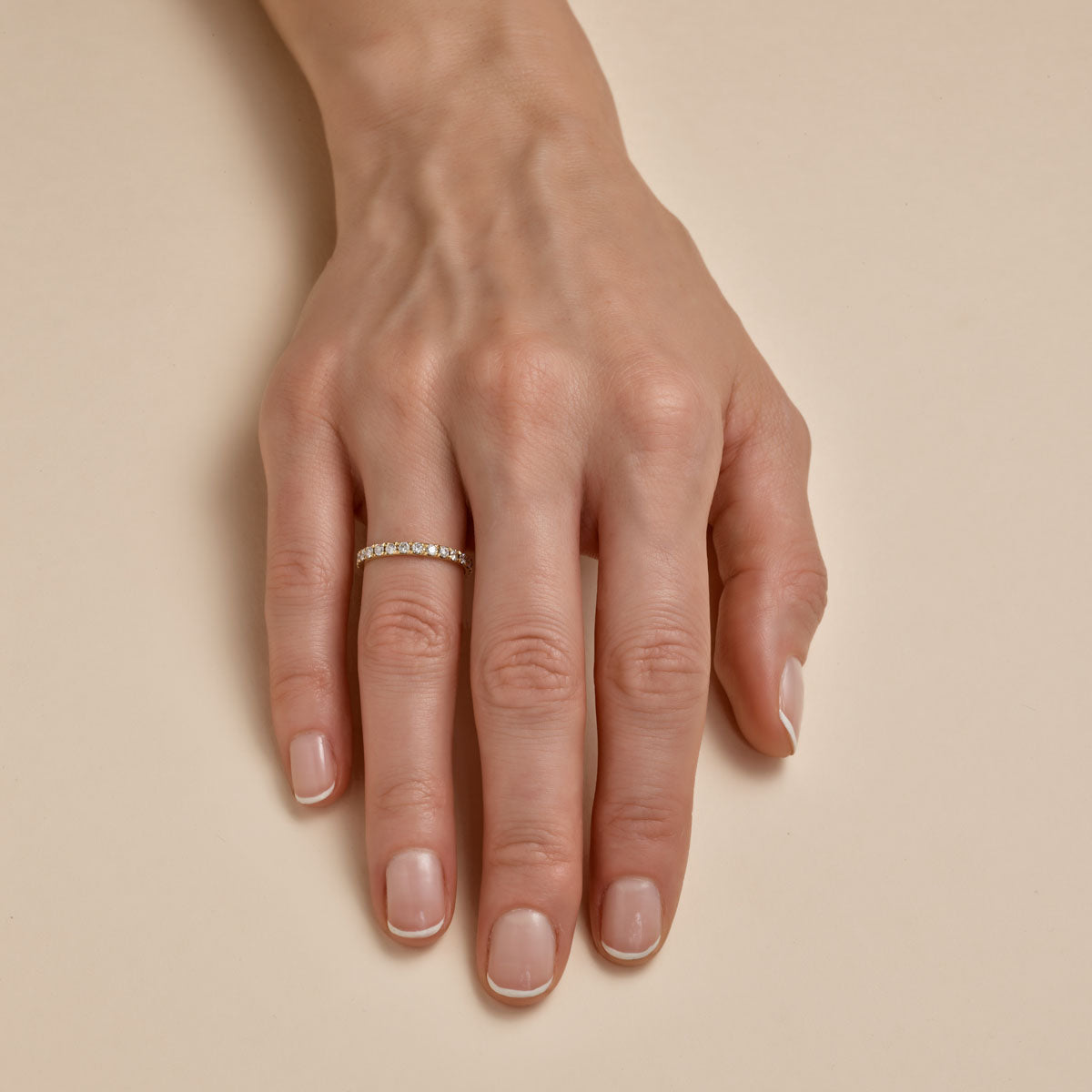 3pt diamond eternity band on womans finger