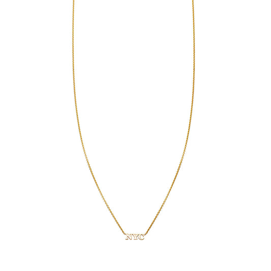 Gold NYC necklace - city-inspired minimalist pendant