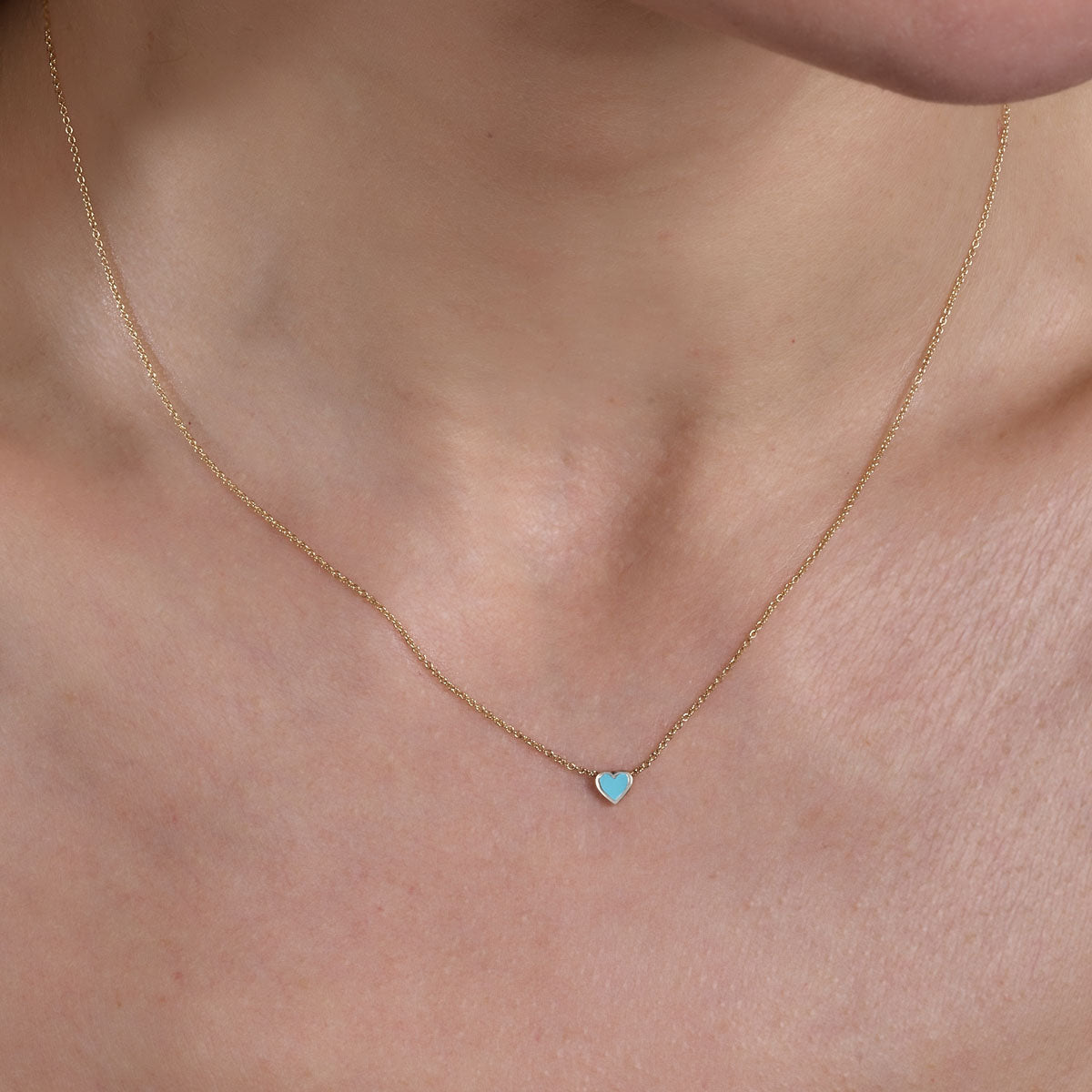 gold turquoise small heart necklace on neck_1