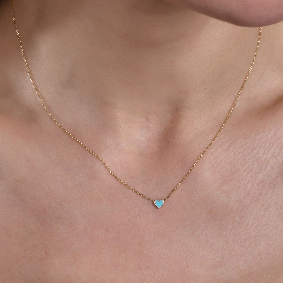 Dainty gold turquoise small heart necklace on neck - boho layering jewelry