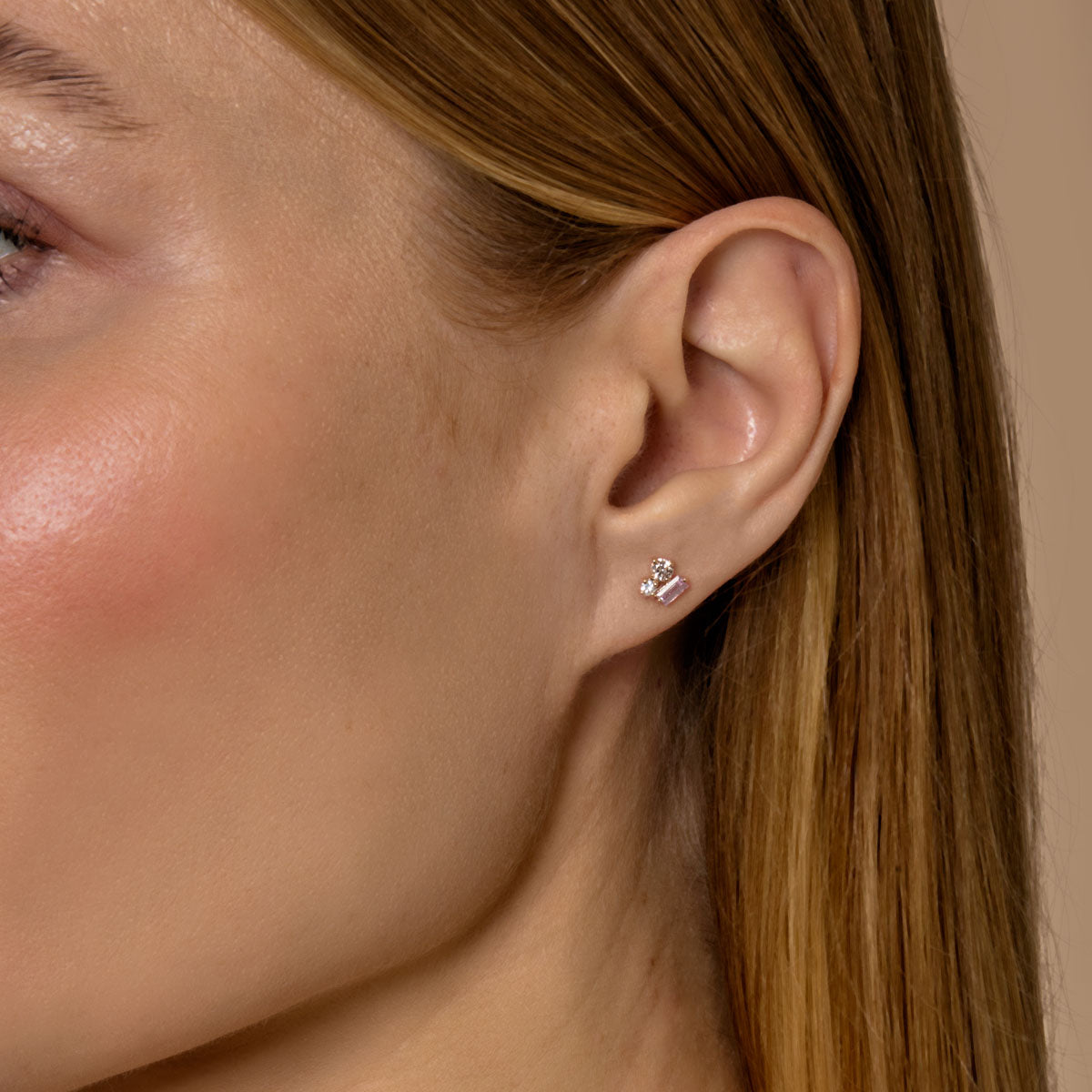 model wearing multi color sapphire cluster earrings