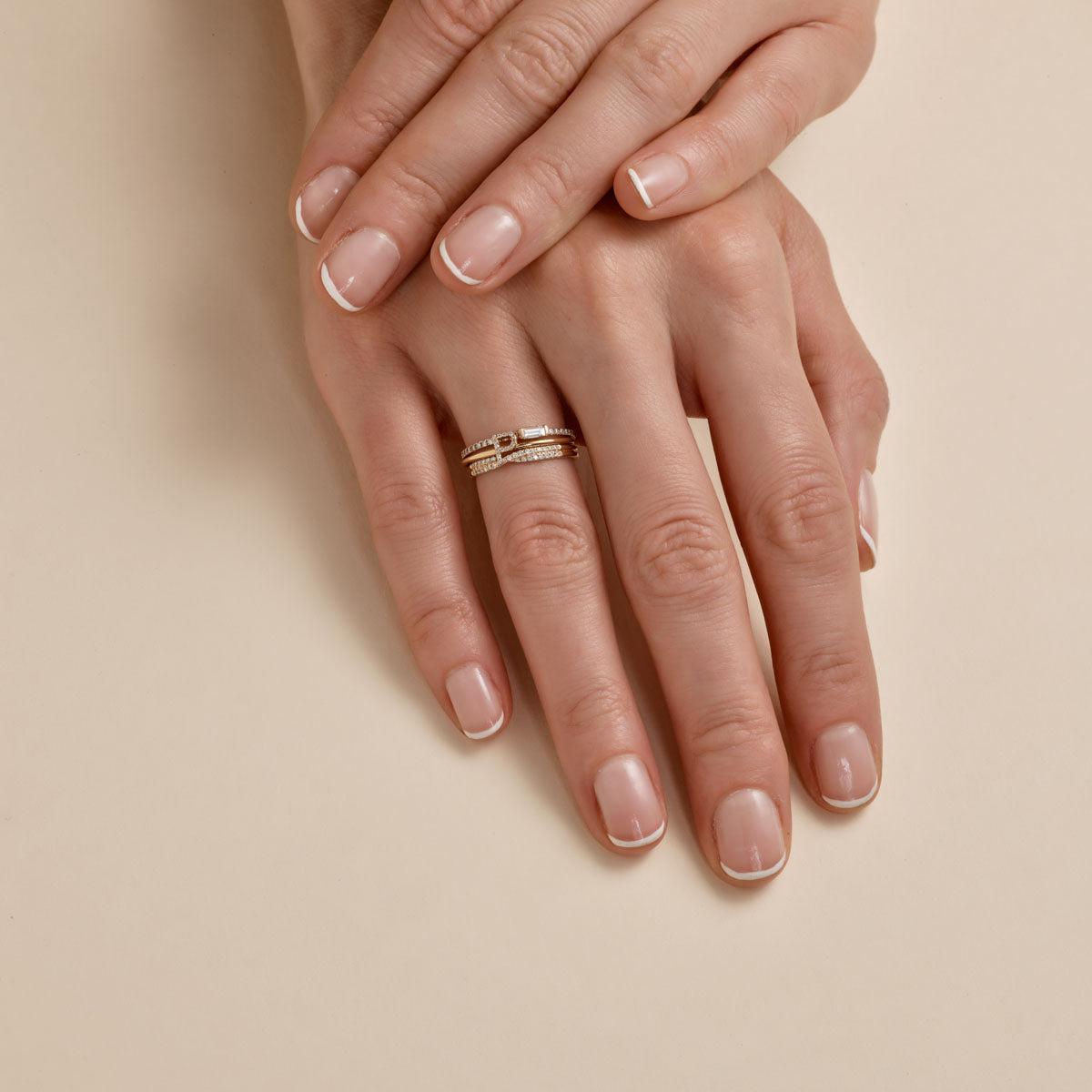 Diamond crossover and gold initial rings - personalized luxury set on woman's finge
